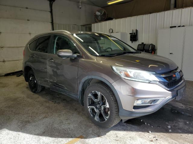 Photo 4 from auction – 2015 HONDA CR-V TOURI with VIN 5J6RM4H92FL077640