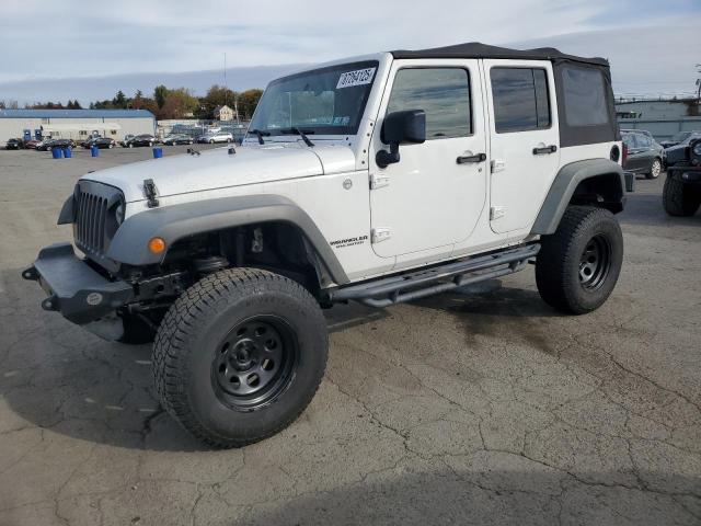 JEEP WRANGLER U 2012 with VIN 1C4HJWFGXCL107843 - Photo from auction
