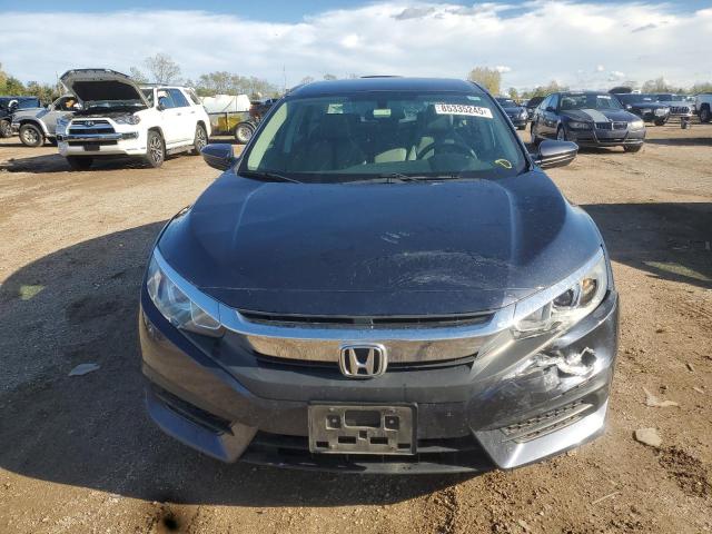 Photo 5 from auction – 2018 HONDA CIVIC with VIN 19XFC2F59JE002337