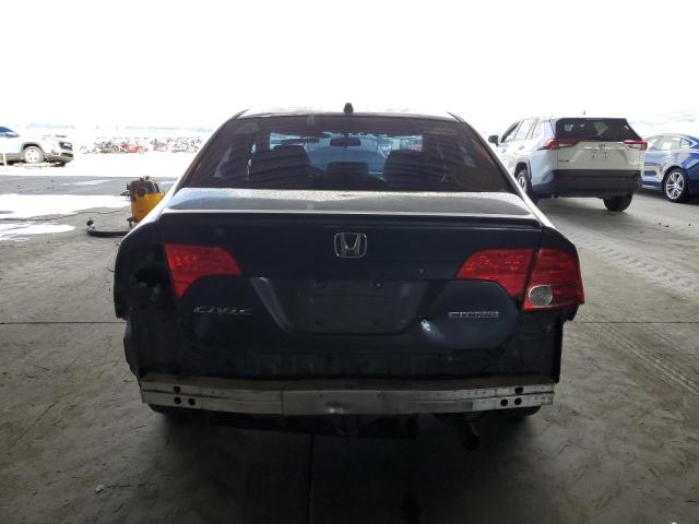 Photo 6 from auction – 2006 HONDA CIVIC HYBR with VIN JHMFA362X6S019331