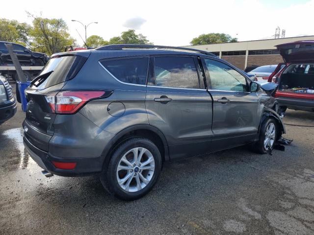 Photo 3 from auction – 2018 FORD ESCAPE SE with VIN 1FMCU0GD8JUC27579