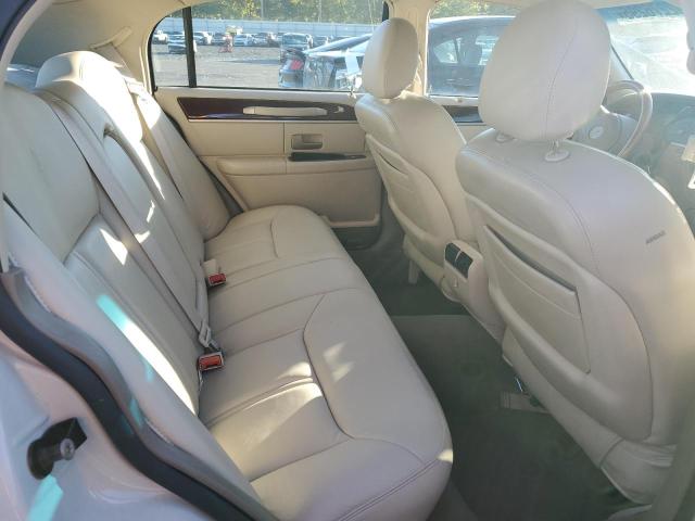 Photo 10 from auction – 2004 LINCOLN TOWN CAR U with VIN 1LNHM83W64Y661699