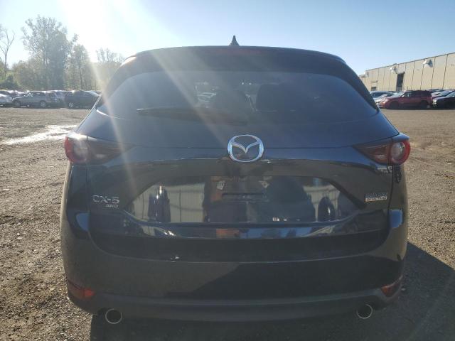 Photo 6 from auction – 2021 MAZDA CX-5 TOURING with VIN JM3KFBCM2M0371000