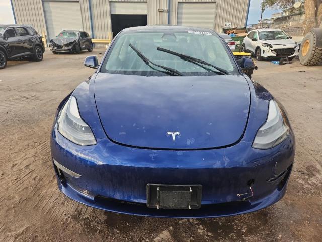 Photo 5 from auction – 2022 TESLA MODEL 3 with VIN 5YJ3E1EA9NF289250