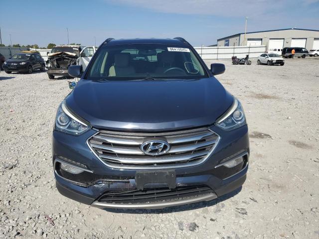 Photo 5 from auction – 2017 HYUNDAI SANTA FE S with VIN 5NMZU3LB6HH017181