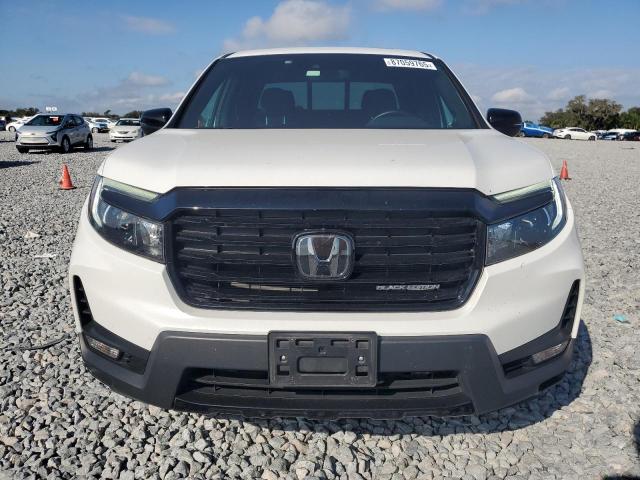 Photo 5 from auction – 2021 HONDA RIDGELINE with VIN 5FPYK3F81MB018341