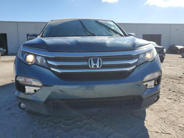 Photo 5 from auction – 2016 HONDA PILOT with VIN 5FNYF5H75GB047701