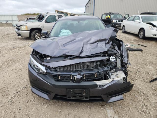 Photo 5 from auction – 2018 HONDA CIVIC EX with VIN 19XFC2F76JE034793