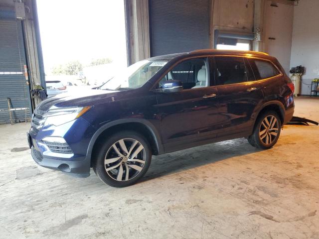 HONDA PILOT ELIT 2017 with VIN 5FNYF6H07HB095615 - Photo from auction