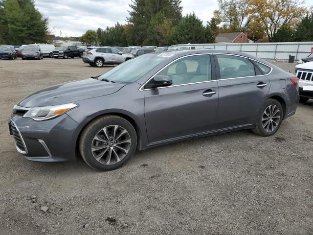 TOYOTA AVALON XLE 2016 with VIN 4T1BK1EB6GU211401 - Photo from auction
