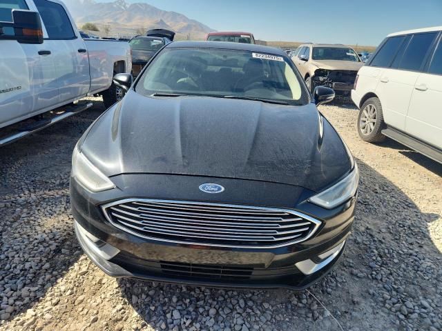 Photo 5 from auction – 2018 FORD FUSION TIT with VIN 3FA6P0RU6JR182158