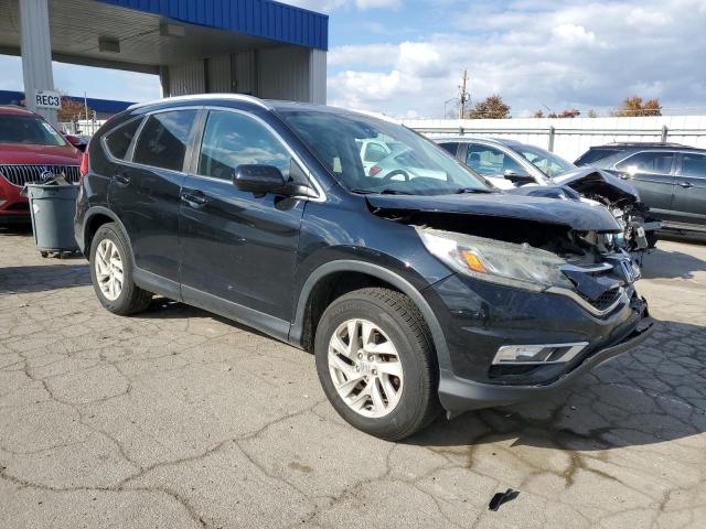 Photo 4 from auction – 2015 HONDA CR-V EXL with VIN 2HKRM4H73FH654894