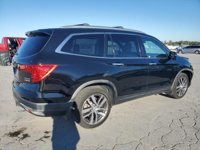 Photo 3 from auction – 2016 HONDA PILOT TOUR with VIN 5FNYF6H96GB093495