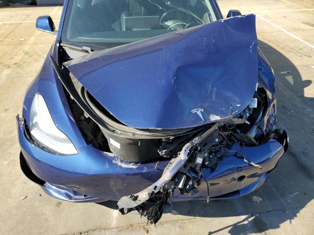 Photo 11 from auction – 2018 TESLA MODEL 3 with VIN 5YJ3E1EAXJF076415