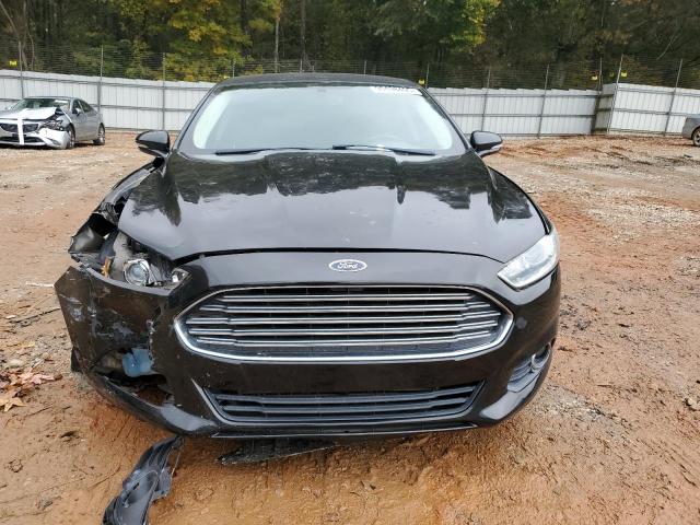 Photo 5 from auction – 2014 FORD FUSION SE with VIN 3FA6P0H90ER328301