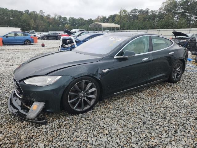 TESLA MODEL S 2013 with VIN 5YJSA1CPXDFP05156 - Photo from auction
