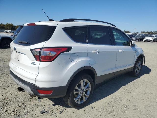 Photo 3 from auction – 2018 FORD ESCAPE SE with VIN 1FMCU9GD6JUC50475