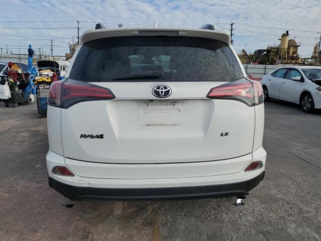 Photo 6 from auction – 2017 TOYOTA RAV4 LE with VIN JTMZFREV4HJ712869