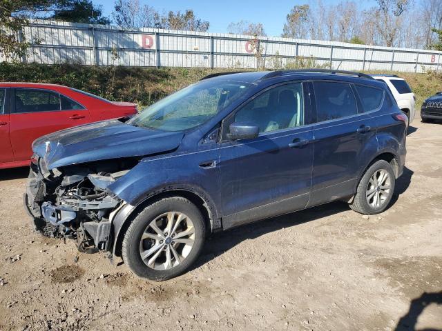 FORD ESCAPE SE 2018 with VIN 1FMCU9GD5JUA96230 - Photo from auction