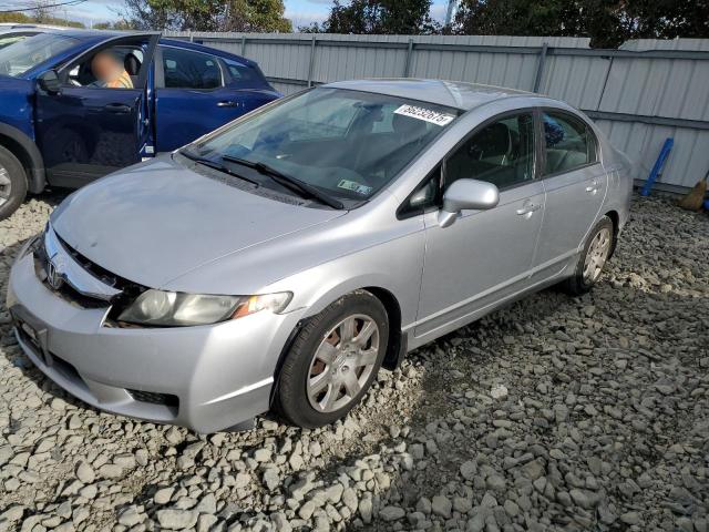 HONDA CIVIC LX 2010 with VIN 19XFA1F58AE061590 - Photo from auction
