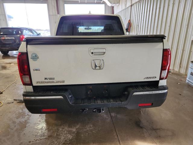 Photo 6 from auction – 2017 HONDA RIDGELINE with VIN 5FPYK3F65HB010103