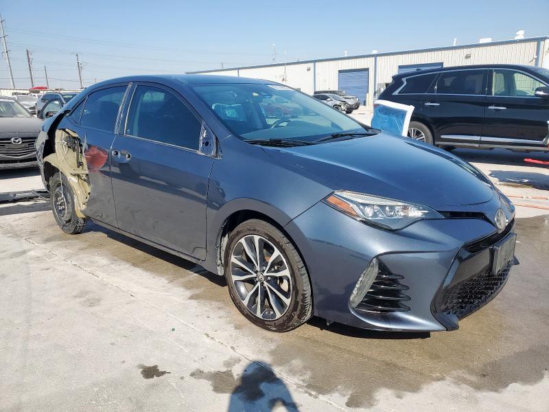 Photo 4 from auction – 2017 TOYOTA COROLLA L with VIN 5YFBURHE3HP596093