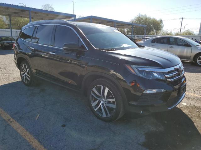 Photo 4 from auction – 2018 HONDA PILOT TOUR with VIN 5FNYF5H95JB017056