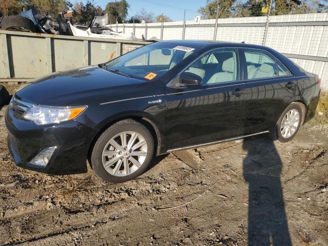 Photo 1 from auction – 2012 TOYOTA CAMRY HYBR with VIN 4T1BD1FKXCU031809