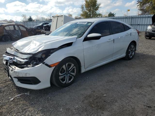 HONDA CIVIC LX 2017 with VIN 2HGFC2F58HH032588 - Photo from auction