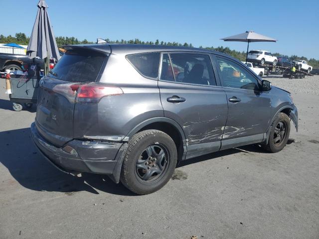Photo 3 from auction – 2018 TOYOTA RAV4 LE with VIN JTMBFREV5JJ730062