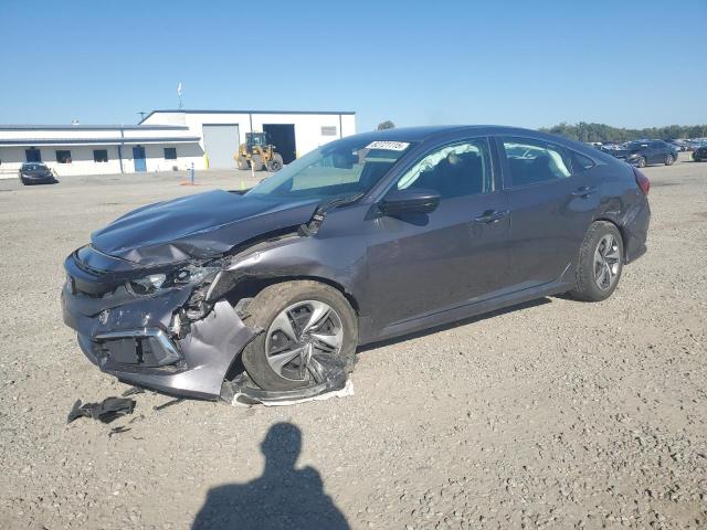 HONDA CIVIC LX 2019 with VIN 2HGFC2F60KH581055 - Photo from auction