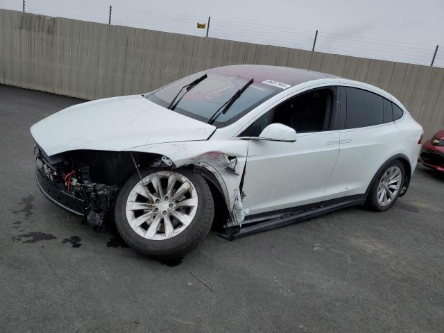 TESLA MODEL X 2018 with VIN 5YJXCAE24JF137449 - Photo from auction