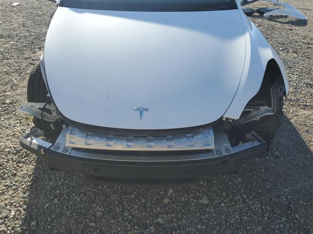 Photo 12 from auction – 2023 TESLA MODEL Y with VIN 7SAYGDEE3PA036898