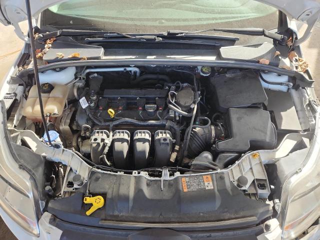 Foto 11 de la subasta – 2014 FORD FOCUS SE con VIN 1FADP3K26EL351276