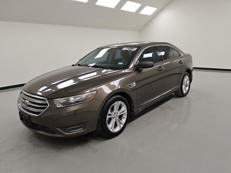 FORD TAURUS SEL 2015 with VIN 1FAHP2E86FG105673 - Photo from auction