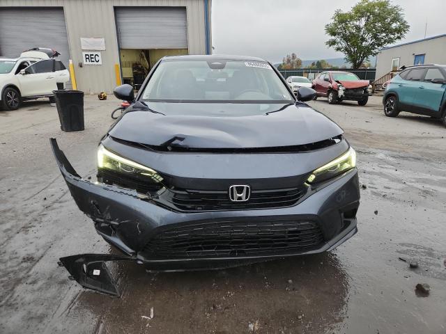 Photo 5 from auction – 2023 HONDA CIVIC EX with VIN 2HGFE1F74PH303425