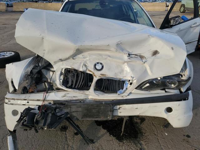 Photo 11 from auction – 2004 BMW 325 XI with VIN WBAEU33444PR06060