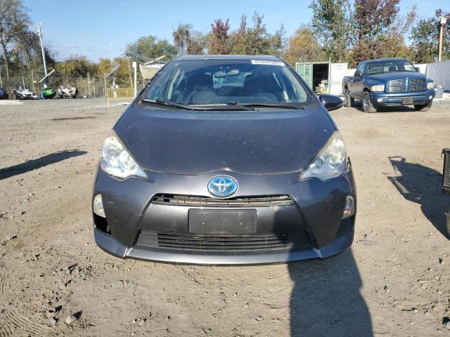 Photo 5 from auction – 2014 TOYOTA PRIUS C with VIN JTDKDTB30E1564481