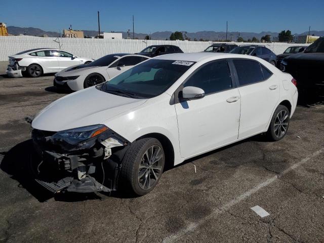 TOYOTA COROLLA L 2017 with VIN 5YFBURHE3HP666725 - Photo from auction