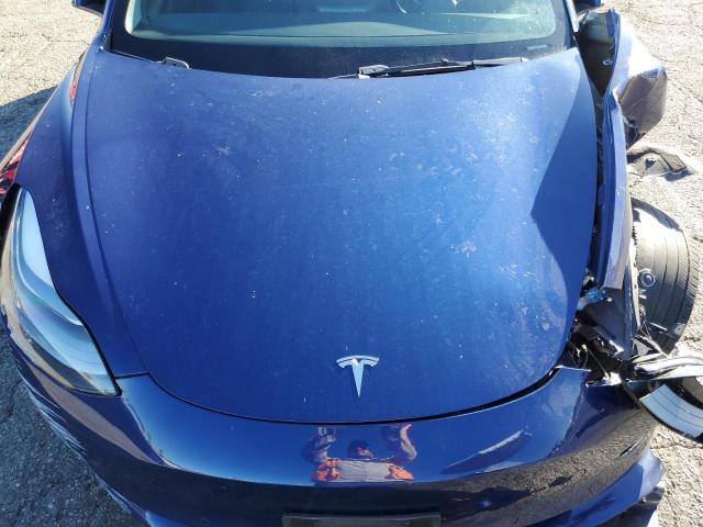 Photo 11 from auction – 2022 TESLA MODEL 3 with VIN 5YJ3E1EAXNF358057