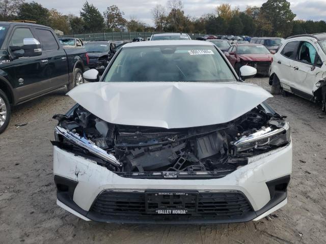 Photo 5 from auction – 2024 HONDA CIVIC LX with VIN 2HGFE2F27RH509397