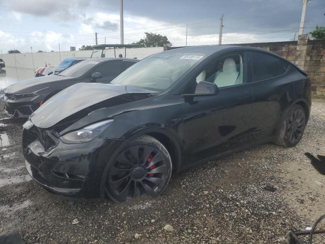 TESLA MODEL Y 2024 with VIN 7SAYGDEF7RF059292 - Photo from auction