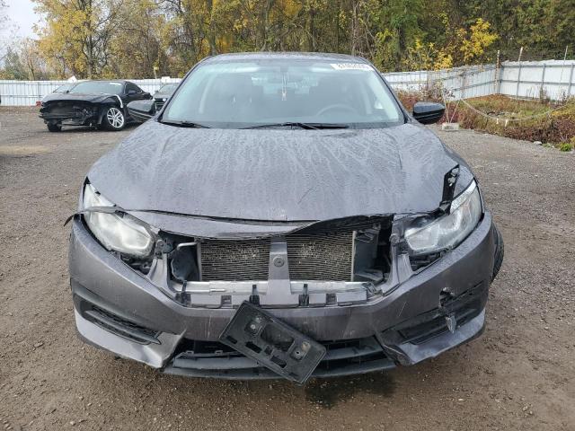 Photo 5 from auction – 2017 HONDA CIVIC LX with VIN 2HGFC2F59HH005920