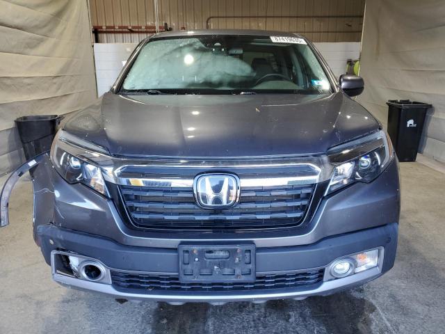 Photo 5 from auction – 2020 HONDA RIDGELINE with VIN 5FPYK3F74LB014581