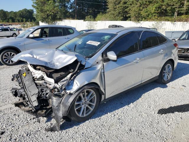 FORD FOCUS SE 2018 with VIN 1FADP3F25JL264571 - Photo from auction