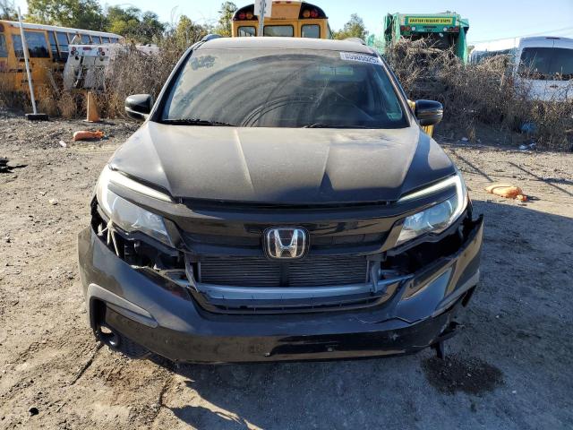 Photo 5 from auction – 2021 HONDA PILOT SE with VIN 5FNYF6H22MB096747