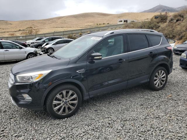 FORD ESCAPE TIT 2017 with VIN 1FMCU9J96HUD42958 - Photo from auction