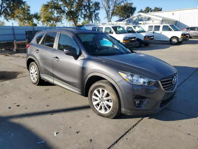 Photo 4 from auction – 2016 MAZDA CX-5 TOURI with VIN JM3KE2CY9G0880916