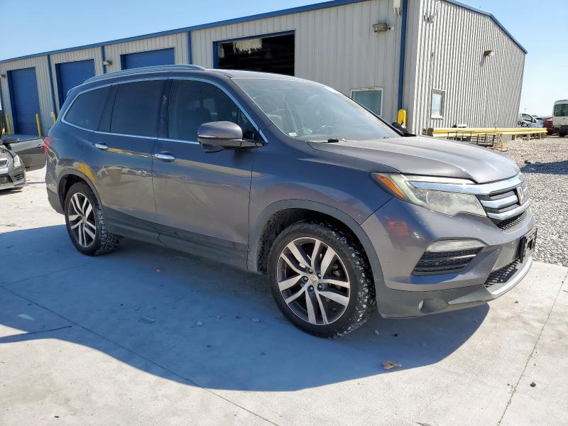 Photo 4 from auction – 2016 HONDA PILOT TOUR with VIN 5FNYF5H95GB036098
