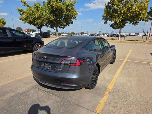 Photo 4 from auction – 2021 TESLA MODEL 3 with VIN 5YJ3E1EB6MF030111